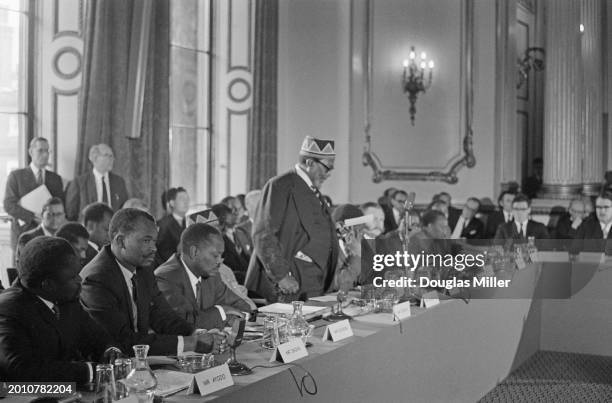 Kenyan politician and anti-colonial activist Jomo Kenyatta, Prime Minister of Keny and leader of the Kenya African National Union , wearing a kofia...