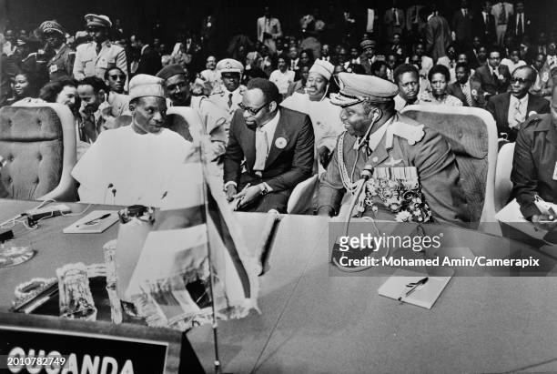 Nigerien politician and military officer Seyni Kountche , President of Niger, in conversation with Ugandan politician and military officer Idi Amin,...