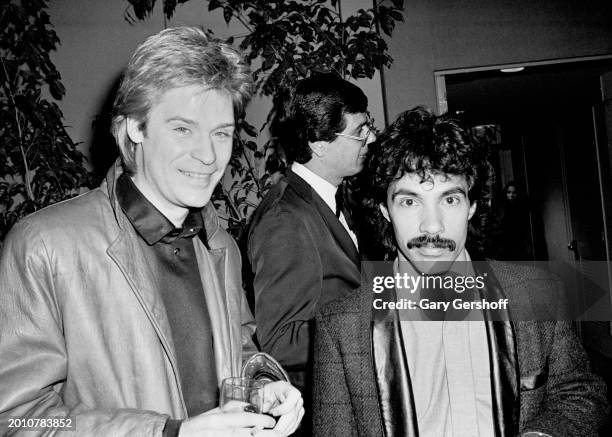 Portrait of American Pop musicians Daryl Hall and John Oates, of the duo Hall & Oates, as they attend WNBC's Source party at the Rainbow Room,...