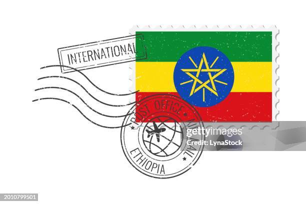 stockillustraties, clipart, cartoons en iconen met ethiopia grunge postage stamp. vintage postcard vector illustration with ethiopian national flag isolated on white background. retro style. - ethiopië