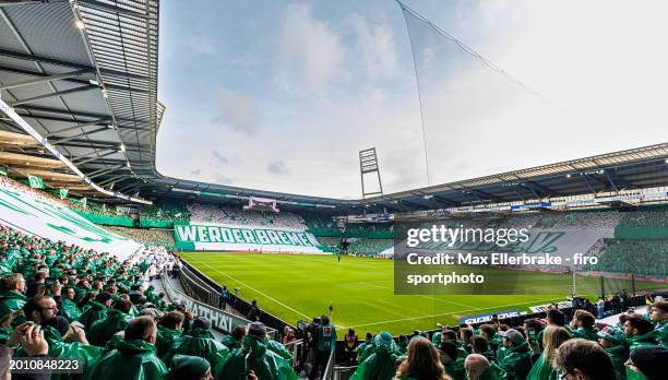 Overview of the Wohninvest Weserstadion in Bremen with a choreography of the fans on Werder's 125th birthday before the Bundesliga match between SV...