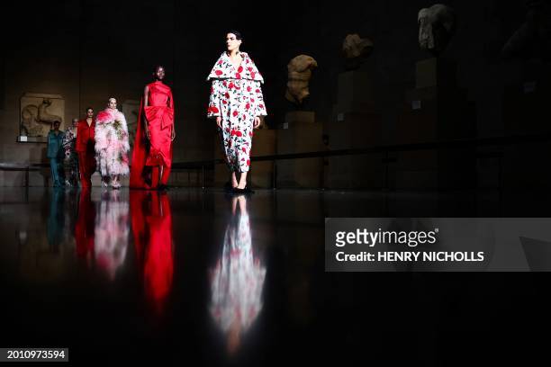 Models present creations for Erdem during their Autumn/Winter 2024 collection fashion show during London Fashion Week in London on February 17, 2024.