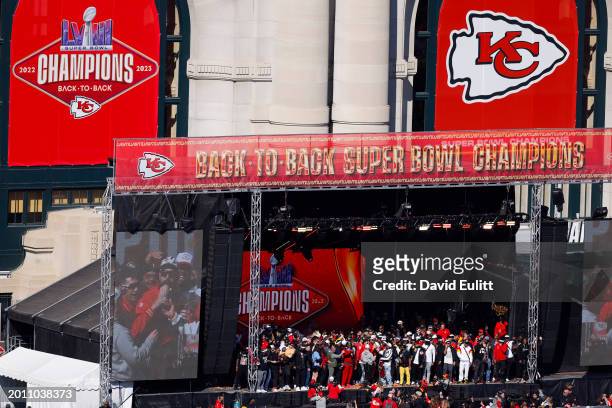 Travis Kelce of the Kansas City Chiefs addresses the crowd during the Kansas City Chiefs Super Bowl LVIII victory parade on February 14, 2024 in...