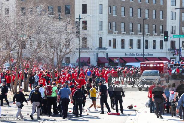 Law enforcement and medical personnel respond to a shooting at Union Station during the Kansas City Chiefs Super Bowl LVIII victory parade on...