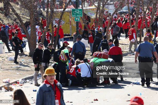 Law enforcement and medical personnel respond to a shooting at Union Station during the Kansas City Chiefs Super Bowl LVIII victory parade on...