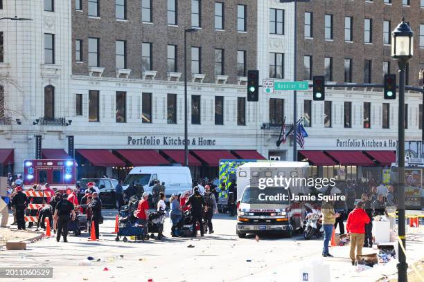 Law enforcement and medical personnel respond to a shooting at Union Station during the Kansas City Chiefs Super Bowl LVIII victory parade on...