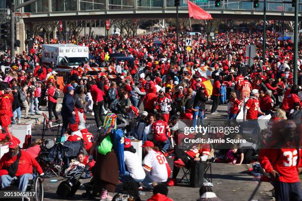 People take cover during a shooting at Union Station during the Kansas City Chiefs Super Bowl LVIII victory parade on February 14, 2024 in Kansas...