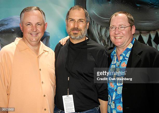 Disney Executive Dick Cook, CEO of Apple Steve Jacobs and producer John Lasseter arrive at the premiere of "Finding Nemo" at the El Capitan theatre...
