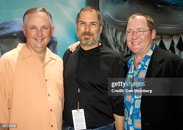 Disney Executive Dick Cook, CEO of Apple Steve Jacobs and producer John Lasseter arrive at the premiere of "Finding Nemo" at the El Capitan theatre...