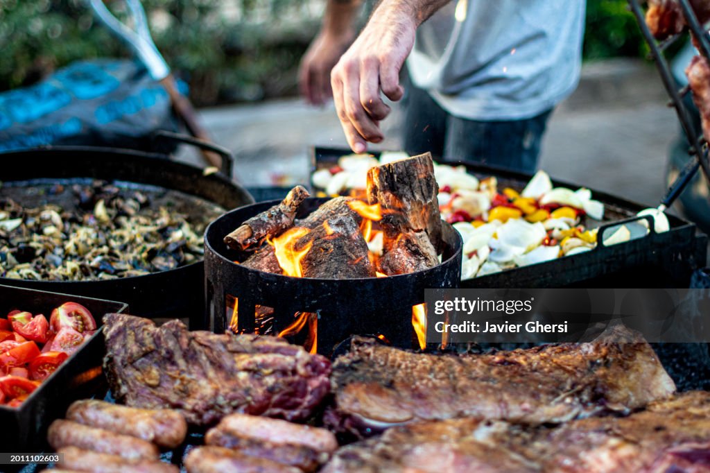 Wood-roasted meats, sausages and vegetables. Asado (traditional Argentine food).