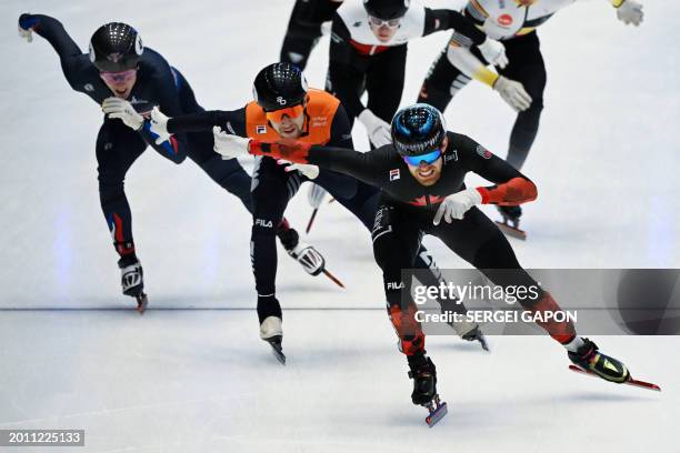 Canada's Dion Pascal , Netherlands' Friso Emons and Britain's Niall Treacy compete in the men 1500m finals at the ISU World Cup Short Track Speed...