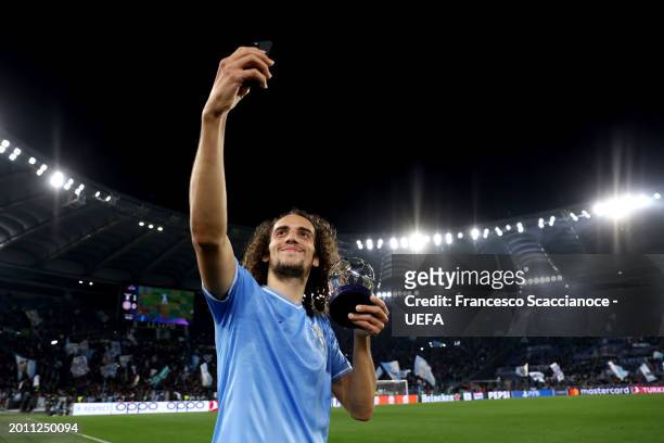 Matteo Guendouzi of SS Lazio poses for a selfie after being awarded the PlayStation Player of the Match at full-time following the team's victory in...