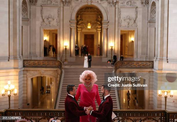 San Francisco Drag Laureate D'Arcy Drollinger marries same-sex couple Jorge Jimenez and Scott Wilson during a "Winter of Love" ceremony at San...