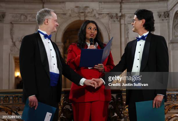 San Francisco Mayor London Breed renews the vows of same-sex couple Stuart Gafney and John Lewis during during a "Winter of Love" ceremony at San...