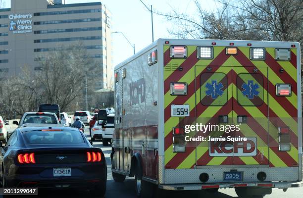 An ambulance heads toward Children's Mercy Hospital after a shooting at Union Station during the Kansas City Chiefs Super Bowl LVIII victory parade...