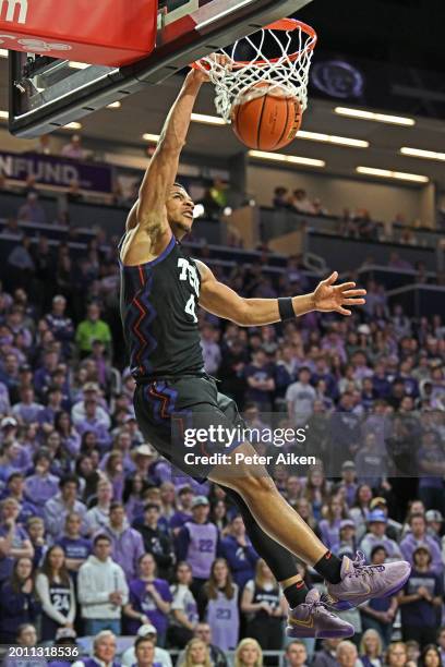 Jameer Nelson Jr. #4 of the TCU Horned Frogs dunks the ball against the Kansas State Wildcats in the first half at Bramlage Coliseum on February 17,...