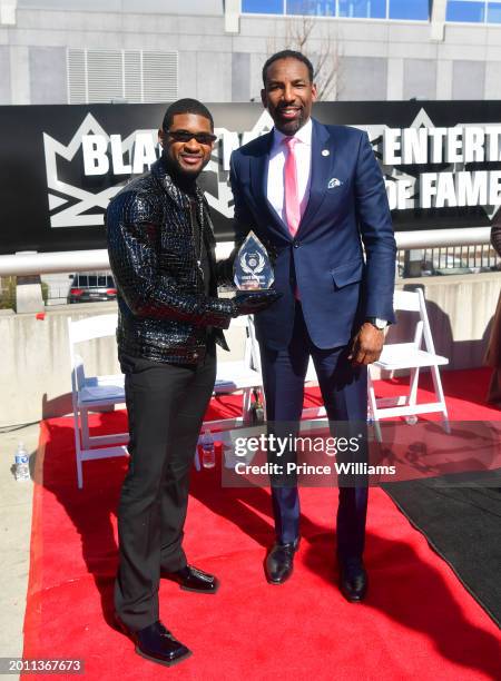 Usher and Andre Dickens attend The Black Music And Entertainment Walk Of Fame Honors Usher at Black Music and Entertainment Walk of Fame on February...