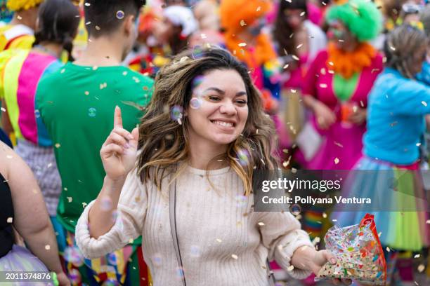 woman dancing at european carnival - street party stock pictures, royalty-free photos & images