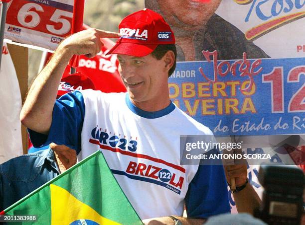 Brazilian presidential candidate for the Social Progressive Party, Ciro Gomes, points to his hat during a political campaign rally in Copacabana, Rio...
