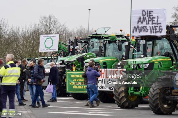 Farmers gather to stage protest against the coalition government's agricultural policies as they convoy with tractors and other agricultural vehicles...