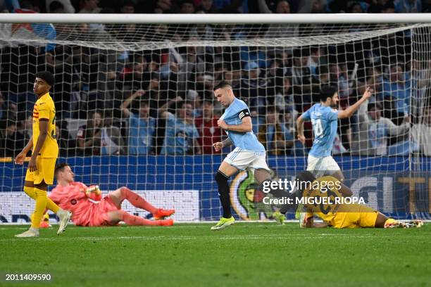 Celta Vigo's Spanish forward Iago Aspas celebrates scoring his team's first goal during the Spanish league football match between RC Celta de Vigo...