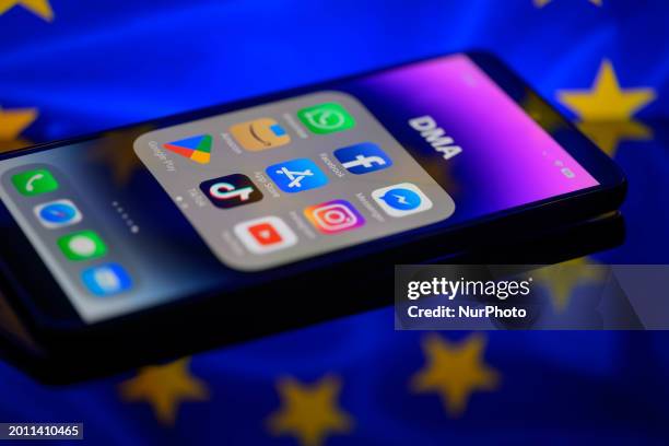 App icons of online platforms Google, Facebook, LinkedIn, Amazon, Apple Store, and TikTok are being displayed on a smartphone with the EU Digital...