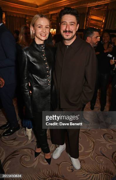 Carey Mulligan and Marcus Mumford attend The 96th Oscars Nominees Reception at The Dorchester on February 17, 2024 in London, England.