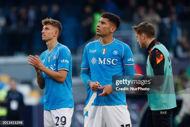 Jesper Lindstrom and Mathias Olivera of Napoli are reacting at the end of the Serie A soccer match between SSC Napoli and Genoa FC at Stadio Maradona...