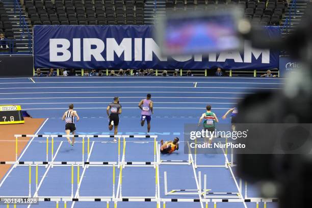 Ethan Akanni is falling in the Men's 60m Hurdles during the UK Indoor Athletics Championships at the Utilita Arena in Birmingham, UK, on February 17,...