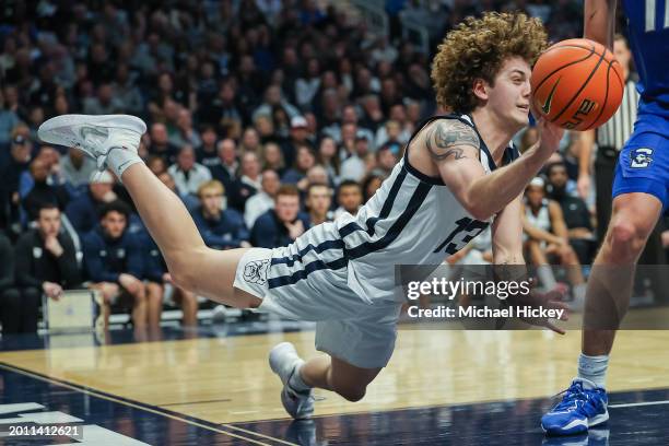 Finley Bizjack of the Butler Bulldogs saves the ball from going out of bounds during the second half against the Creighton Bluejays at Hinkle...