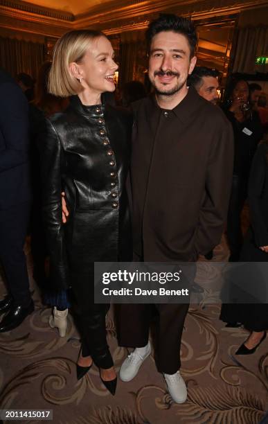 Carey Mulligan and Marcus Mumford attend The 96th Oscars Nominees Reception at The Dorchester on February 17, 2024 in London, England.