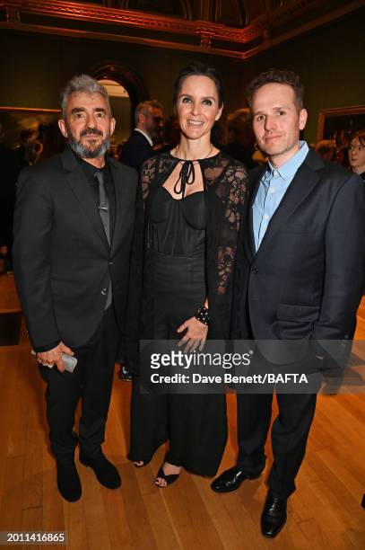 Daniel Battsek, Channel 4 CEO Alex Mahon and Ollie Madden attend the Nominees' Party for the EE BAFTA Film Awards 2024, supported by Bulgari at The...