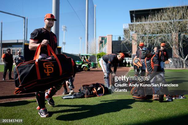 Joey Bart of the San Francisco Giants prepares to catch a bullpen session during the San Francisco Giants Spring Training work out at Scottsdale...