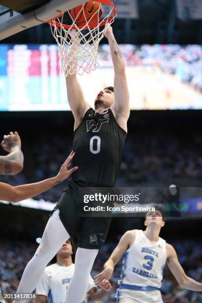 Virginia Tech Hokies guard Hunter Cattoor slimes the ball during the college basketball game between the North Carolina Tar Heels and the Virginia...