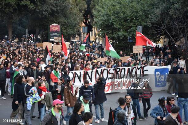 People carrying Palestinian flags and banners attend a pro-Palestine demonstration to protest state-owned broadcaster RAI's endorsement of Israel...