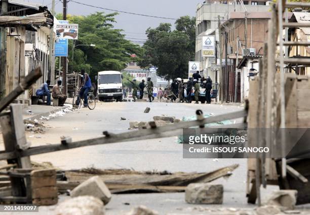 Detachment of Togololese policemen patrol after militants of the Togolese opposition set up barricades on the streets of Lome following violent...