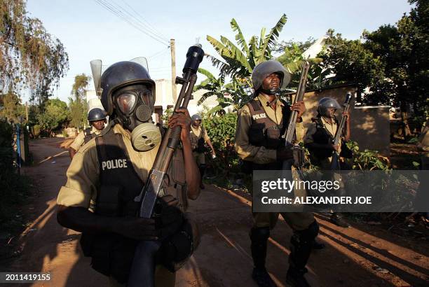 Ugandan police search for rock-throwers 25 February 2006 after dispersing with live rounds and teargas supporters of opposition leader Kizza Besigye...