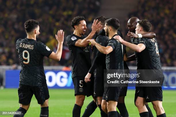 Marquinhos of Paris Saint-Germain celebrates the goal of Lucas Hernandez of Paris Saint-Germain during the Ligue 1 Uber Eats match between FC Nantes...