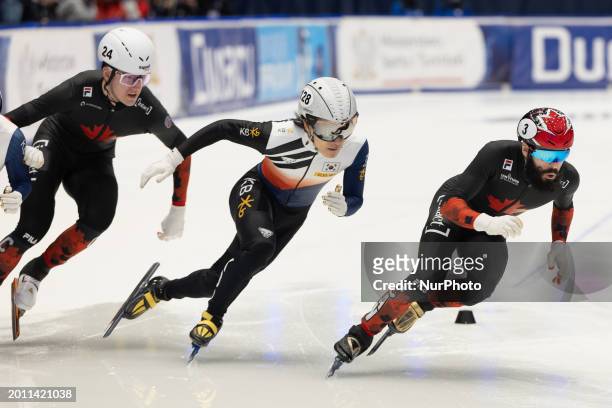 Felix Roussel, Yi Ra Seo, and Steven Dubois are competing in the men's 500m event on the second day of the ISU World Cup Short Track Speed Skating in...