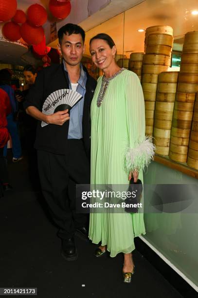 Self-Portrait designer Han Chong and CEO of the British Fashion Council Caroline Rush attend the BFC x Self Portrait Lunar New Year Party during...