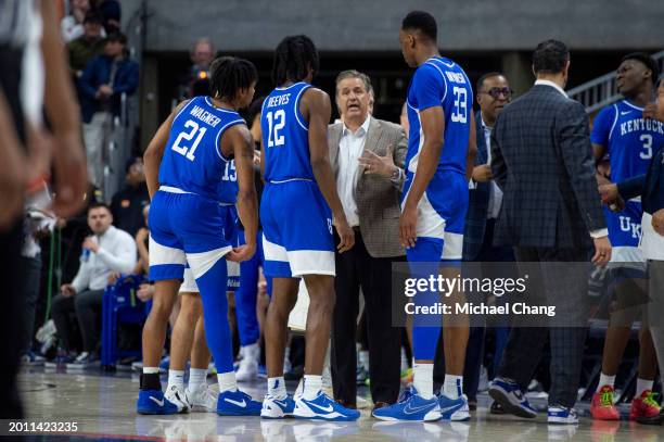 Head coach John Calipari of the Kentucky Wildcats talks to his players during the second half of their game against the Auburn Tigers at Neville...