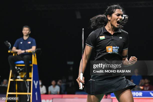 India's Pusarla V. Sindhu reacts after scoring a point against Thailand's Supanida Katethong in their women's singles finals match at the 2024...