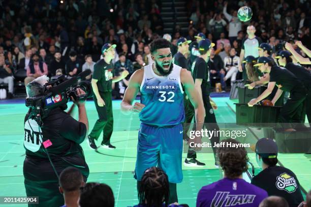 Karl-Anthony Towns of the Minnesota Timberwolves celebrates during the Starry 3-point contest as a part of State Farm All-Star Saturday Night on...