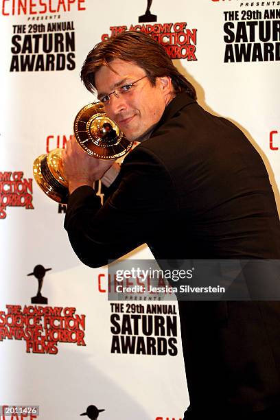 Actor Nathan Fillion attends the 29th Annual Saturn Awards presented by Cinescape May 18, 2003 at the Renaissance Hollywood Hotel in Los Angeles,...