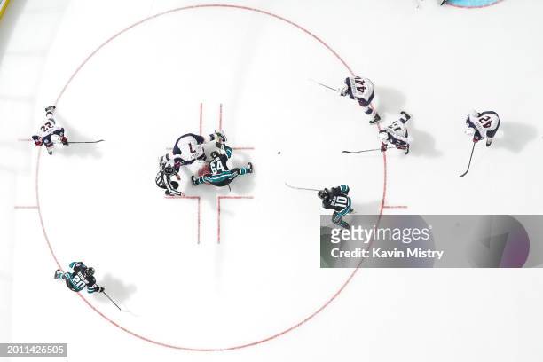 An overhead view as Mikael Granlund of the San Jose Sharks takes a face-off against Sean Kuraly of the Columbus Blue Jackets in the second period at...