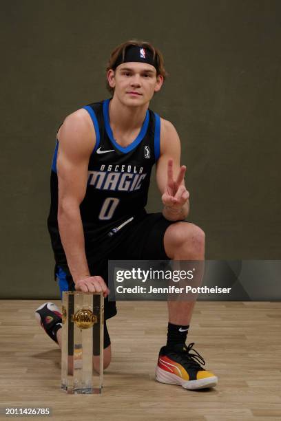 Mac McClung of the Osceola Magic pose for a photo after winning the AT&T Dunk Contest during State Farm Saturday Night NBA All-Star Weekend on...