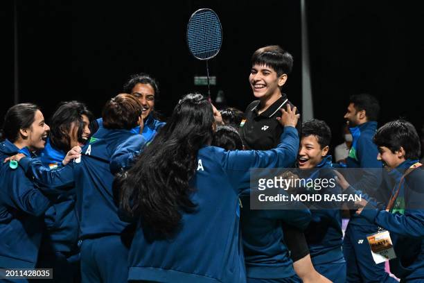 India's Anmol Kharb celebrates after winning against Thailand's Pornpicha Choeikeewong in their women's singles final match at the 2024 Badminton...