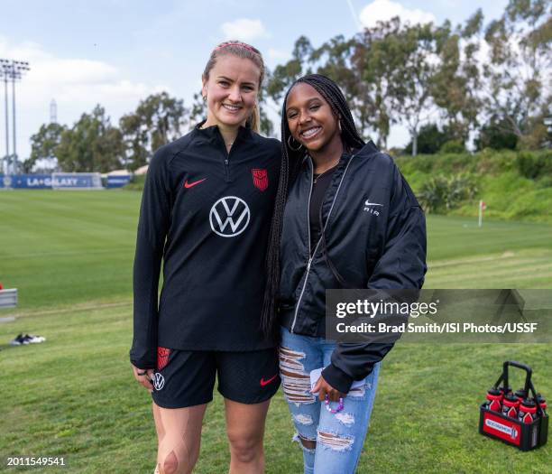 Lindsey Horan of the United States poses with a youth national team player Leena Powell after USWNT Training at Dignity Health Sports Park on...