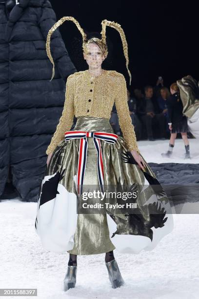 Alex Consani walks the runway during the Thom Browne Fall 2024 fashion show to close New York Fashion Week at The Shed on February 14, 2024 in New...