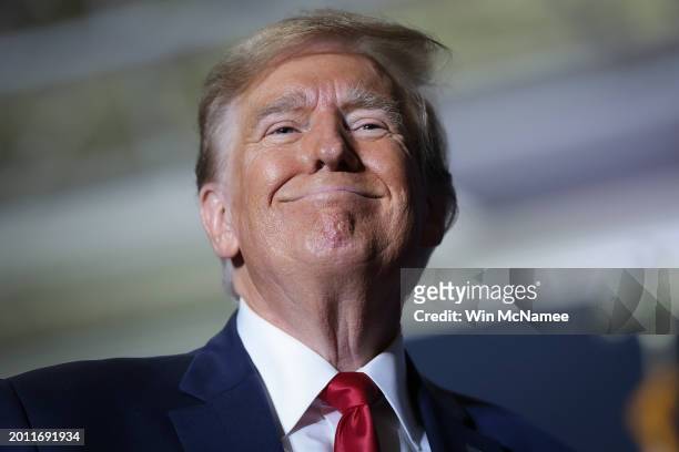 Republican presidential candidate, former U.S. President Donald Trump smiles at supporters after speaking at a Get Out The Vote rally at the North...
